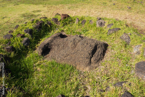 Moai statue with only the face exposed at Ahu Vinapu, Rapa Nui National Park, Easter Island, November 2025