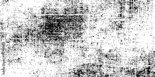 Abstract Grunge Pattern: A high-contrast, textured monochrome image evokes a sense of age, decay, or artistic expression through its gritty, weathered surface.