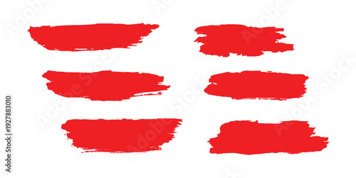 Set of red and pink watercolor paint strokes and splashes with grunge brush textures on paper for artistic design elements