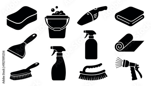 Black silhouette icon set of cleaning and car washing tools including a sponge, bucket, vacuum, spray bottle, brush, and hose nozzle for detailing and household chores