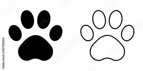Two contrasting paw prints one black one white outline