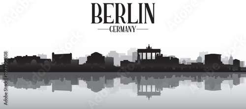 Black and white panoramic poster of the city skyline with misty background buildings and water reflection of BERLIN, GERMANY