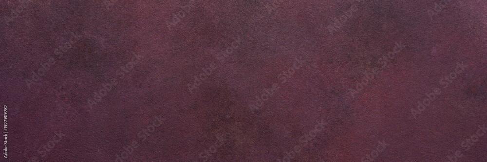Fototapeta premium A dark maroon surface exhibits a subtle texture. Light and dark variations create a smooth, blended effect over the entire area, banner