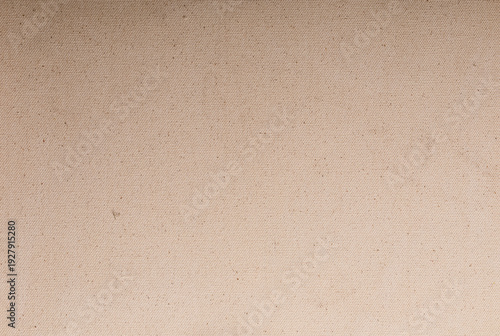 Tableau sur toile Close-up of a tan canvas texture, perfect for backgrounds, art, craft projects, or adding a natural feel