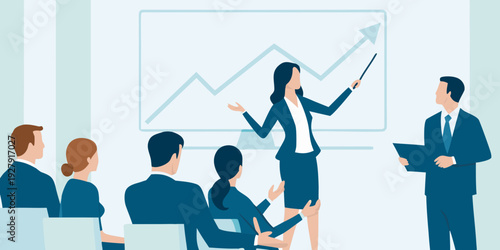 Businesswoman presenting growth chart to attentive colleagues in a meeting