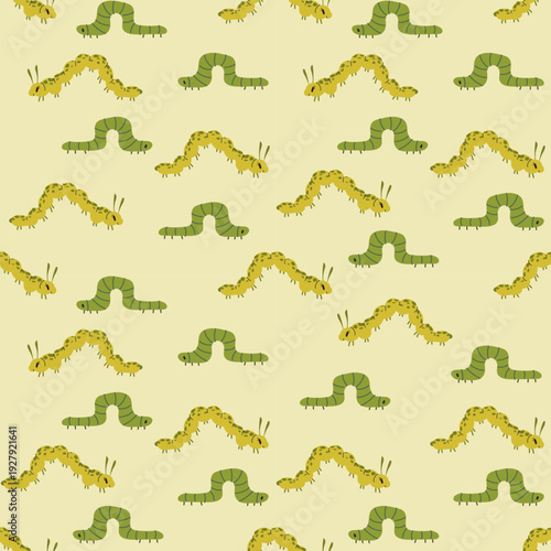 Cute vector pattern with green caterpillars on a pastel background. Seamless design for nursery, kids clothes, wallpapers, prints