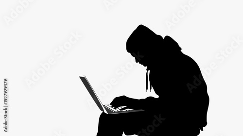 Silhouette of person using laptop computer against a white background