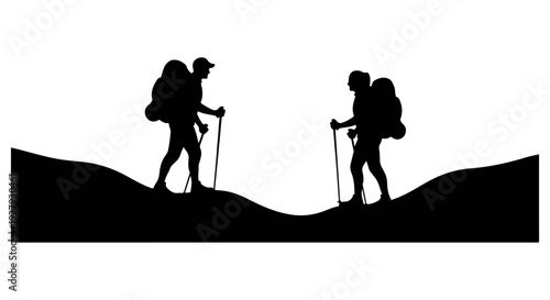 Silhouettes of two hikers with backpacks walking along a ridgeline