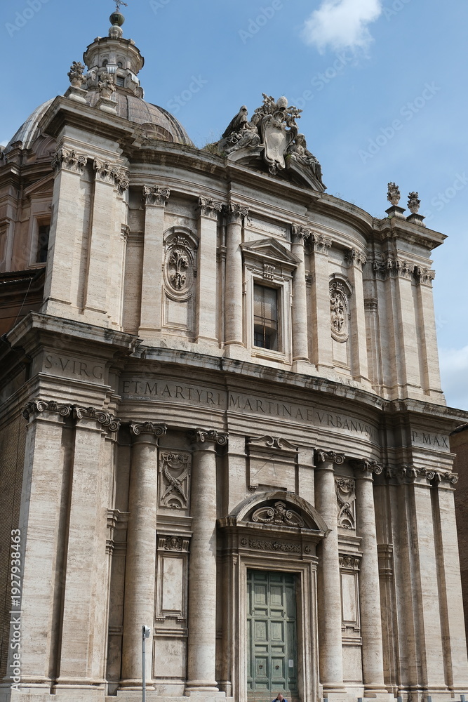 Obraz premium Ornate Baroque church facade with detailed stonework under a bright sky