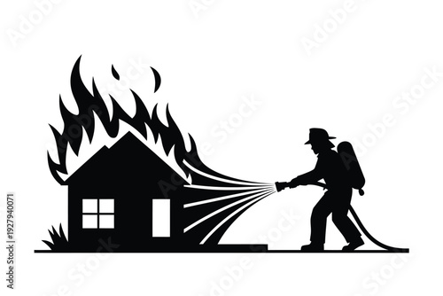 A firefighter battles a blazing house fire with a water hose