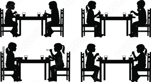 Black silhouettes of young children sitting at tables eating breakfast or dinner with spoons and glasses isolated on a clean white background