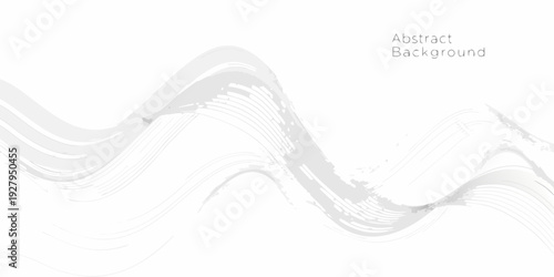 Abstract white lines forming a dynamic wave pattern on a gray background
