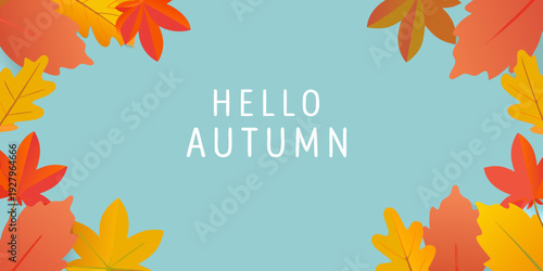 Autumn leaves and a welcoming hello autumn message on blue