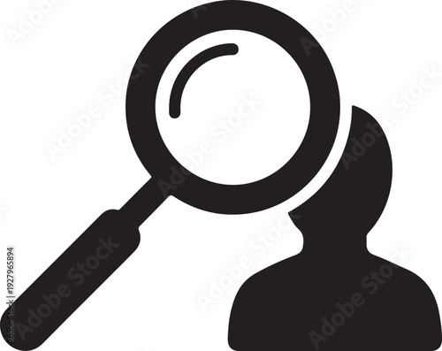 Silhouette of a person's head with a magnifying glass examining it, representing analysis and introspection
