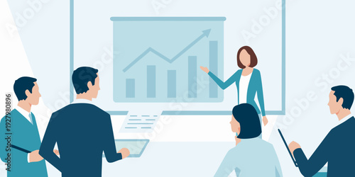 Business presentation with a female speaker and attentive audience members