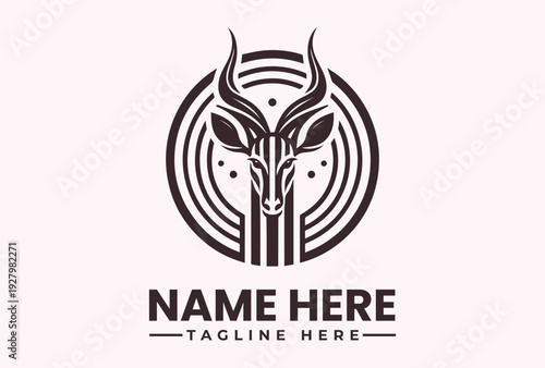 A minimalist logo design featuring a stylized antelope head within concentric circles on a pale background with space for a custom name and tagline.