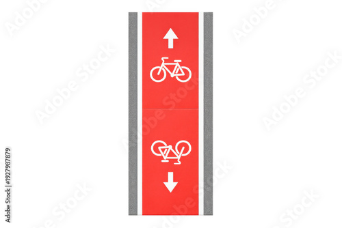 Red bicycle lane with directional arrows and bike symbols for two-way traffic