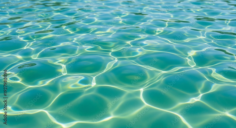 Obraz premium Water Surface Gleams Beautifully Creating Abstract Light Patterns