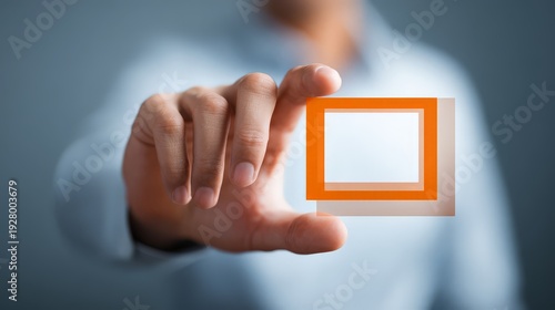 Wallpaper Mural A professional interacting with a digital interface, symbolizing the ability to frame or focus on specific data or goals. Torontodigital.ca