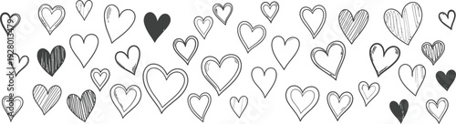 A myriad of simplistic hearts in various grayscale shades scattered across a plain white background viewed from directly above