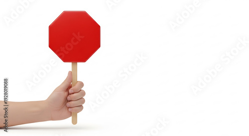 Wallpaper Mural Hand firmly holds stop sign creating stark contrast. Torontodigital.ca