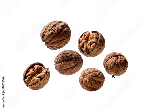 a handful of walnuts in the air, transparent background