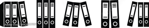 A collection of black and white binder clips arranged in a row on a plain background