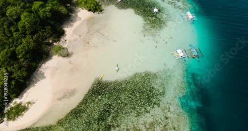 Wallpaper Mural Tour boats floating over crystal clear water. Coral reefs in CYC Beach. Coron, Palawan. Philippines. Torontodigital.ca