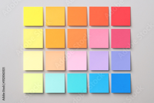 Colorful sticky notes arranged in a structured swatch grid. Vibrant creative background ideal for planning, productivity concepts and office stationery presentations. 
