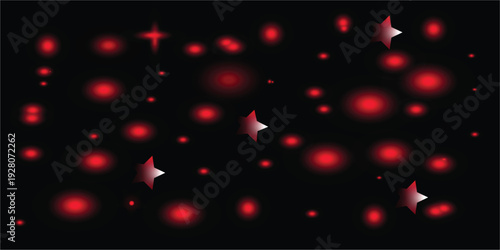A blurry image of red and white spots on a black background