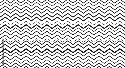 Seamless monochrome pattern of repeating black and white zigzags or chevron stripes with varying line weights for modern textiles.