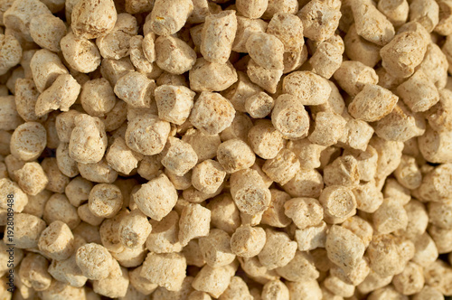 Background from compound feed. Feed for pigs, cows, chickens. Compound feed