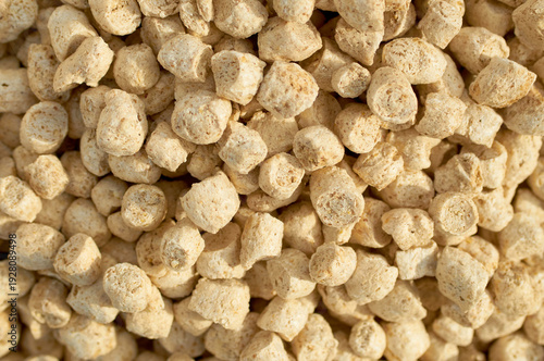 Background from compound feed. Feed for pigs, cows, chickens. Compound feed