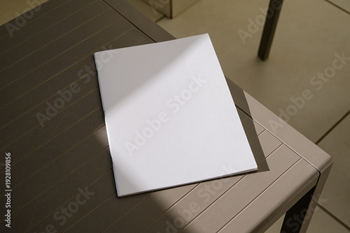 empty magazine mockup on plastic table tile floor in the room, shadow overlay