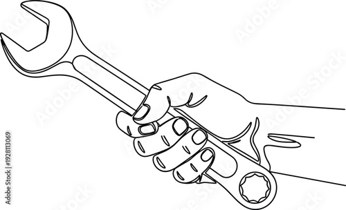 Hand holding wrench tool for repair and maintenance work industrial mechanical metal object equipment part close up