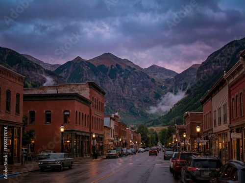 Scenic View of Historic Mountain Town Street at Twilight with Purple Mountains