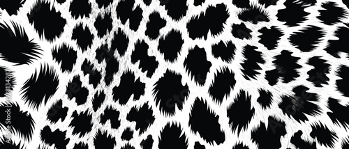Dynamic Black-and-White Leopard Fur Pattern with Jagged Spots Creating Flowing Movement