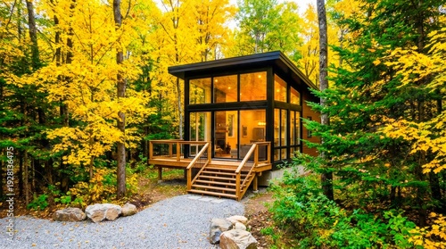 Wallpaper Mural Modern Forest Cabin in Autumn Woods with Glowing Interior and Deck Torontodigital.ca