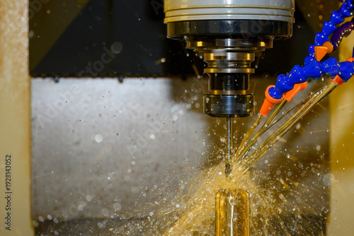 Canvas Print Advanced CNC milling of brass material using oil coolant lubrication and a ball nose end mill for high-precision surface finishing