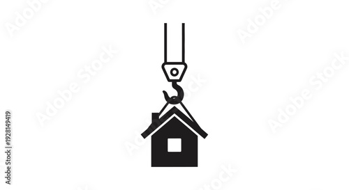 House lifted by crane hook.