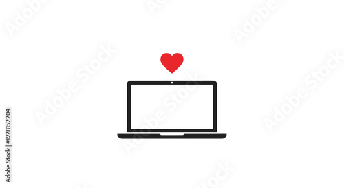 Laptop with heart on screen.