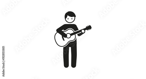 Man playing acoustic guitar standing.