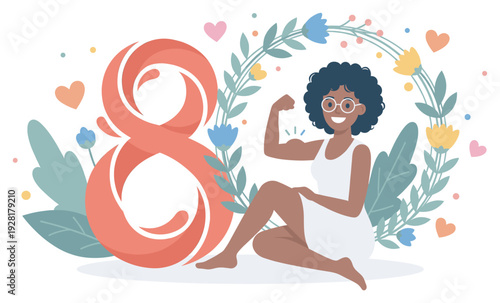 Strong empowered woman with curly hair flexing her bicep and smiling, sitting by a large number eight decorated with a floral wreath for a festive Women's Day greeting