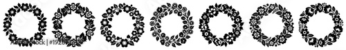 Set of seven circular floral wreaths and miniature decorative ornaments in traditional folk style