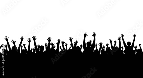 Silhouetted crowd of people raising their hands in celebration.