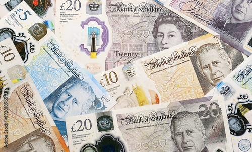 Wallpaper Mural British pound money bills pile on table. United Kingdom banknotes of GBP currency close up. Torontodigital.ca