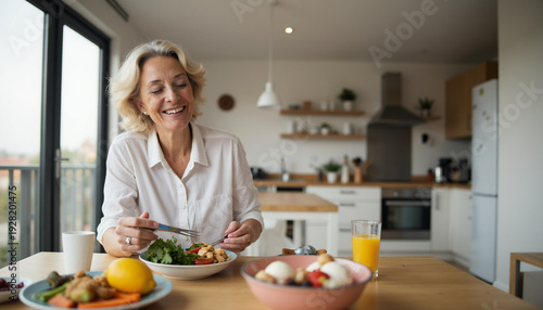 Joyful Woman Enjoying Healthy Breakfast in Modern Kitchen