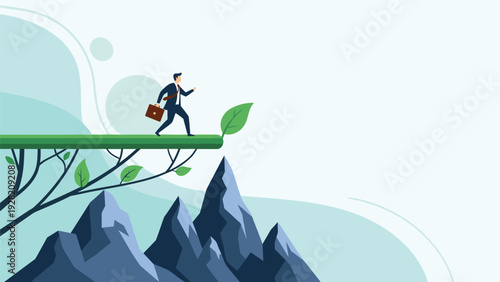 brave businessman walking on a thin green branch over a mountain cliff represents risk taking and sustainable business growth.