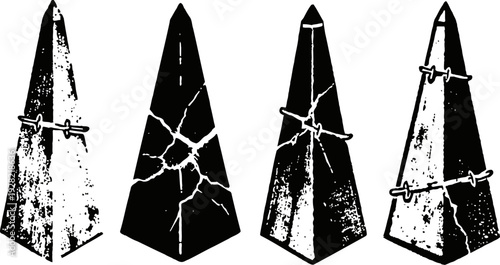 Abstract grunge cracked four obelisk shapes in black and white with distressed texture