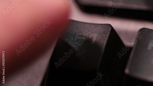 Pressing F1 button for help and support on computer keyboard, macro shot of human finger.